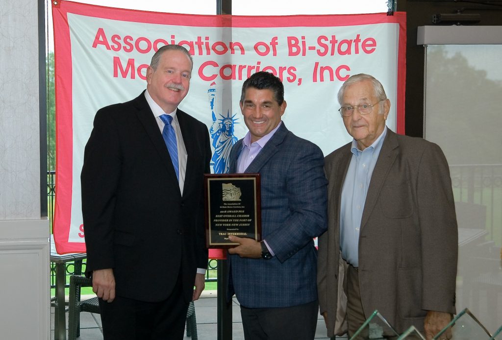 Lou Testa, VP of Operations at TRAC Intermodal, accepting the NY-NJ Award for Best Overall Chassis Provider on behalf of TRAC Intermodal.